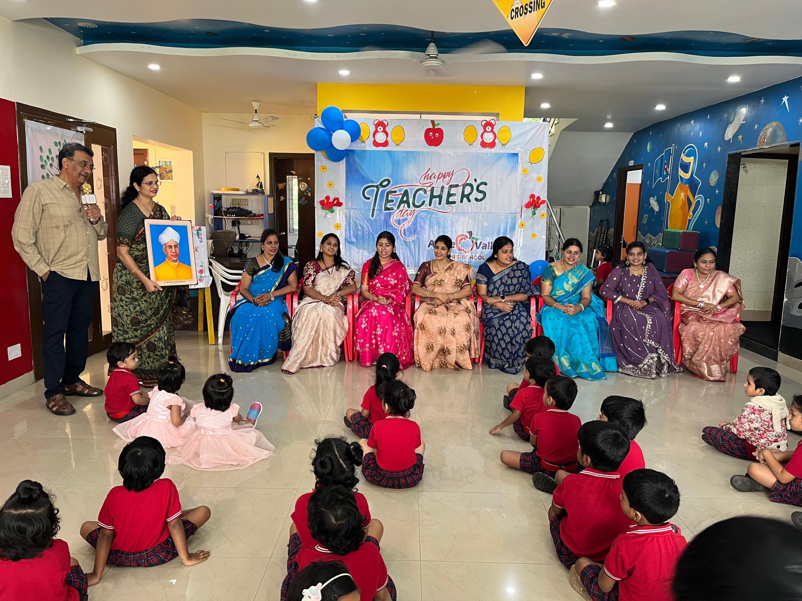 Teacher explaining to children